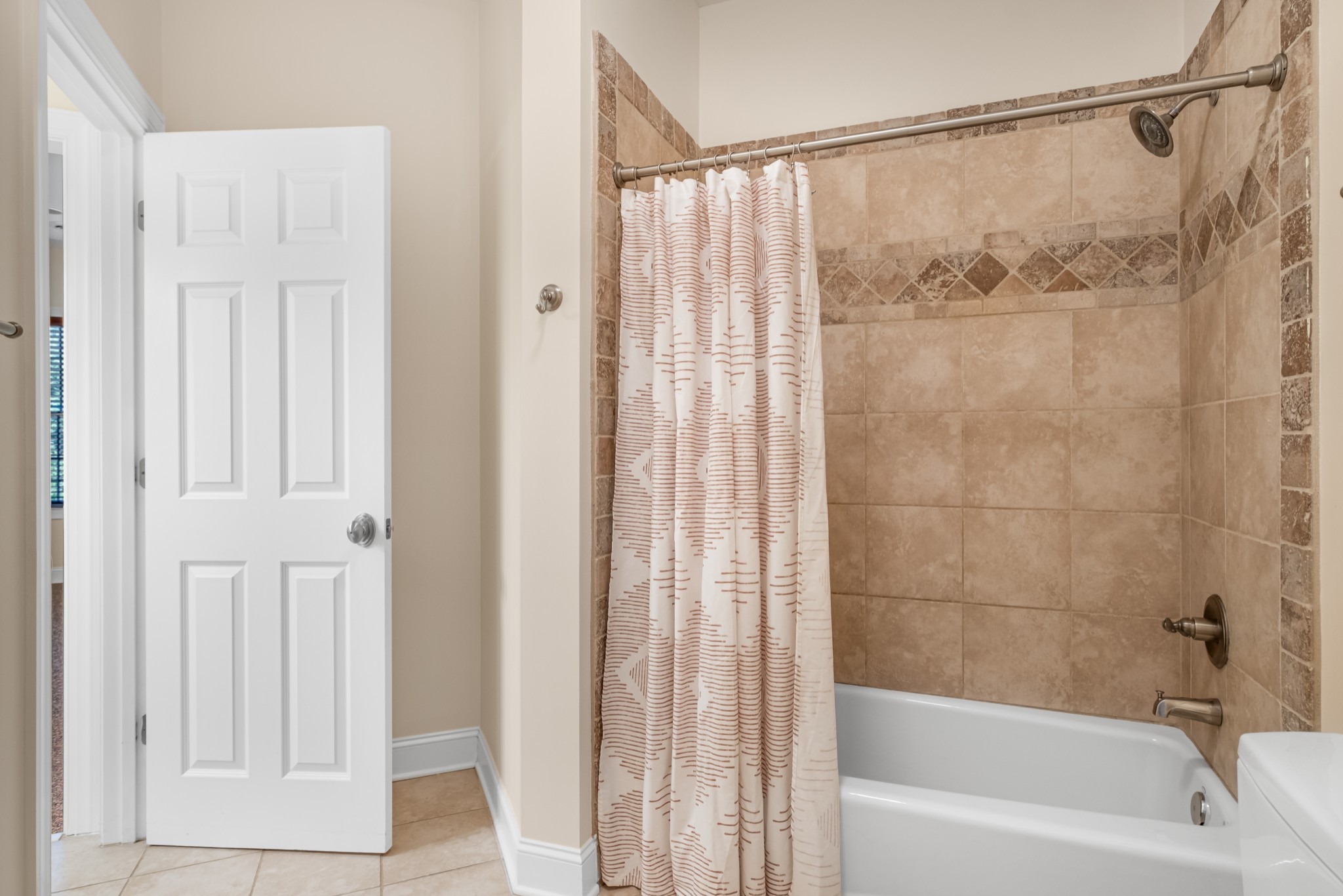 424 Sandcastle Road Franklin, TN 37069 - Photo 53 of 65 a bathroom with a shower and a bath tub