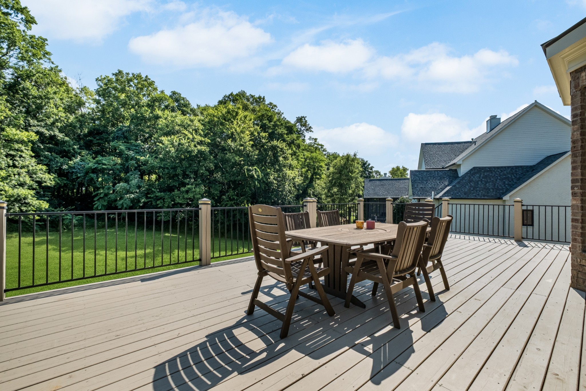 424 Sandcastle Road Franklin, TN 37069 - Photo 55 of 65 a view of a roof deck with table and chairs