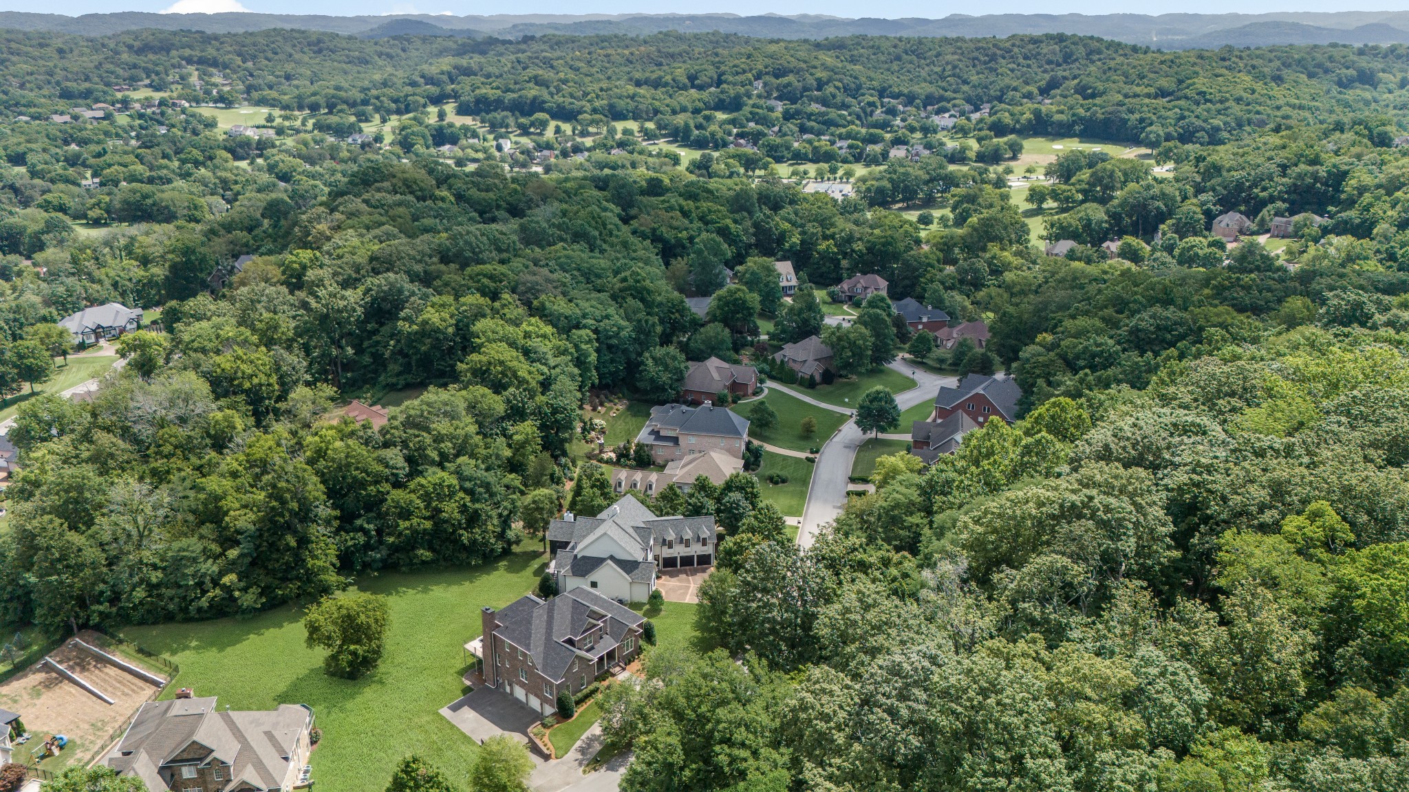 424 Sandcastle Road Franklin, TN 37069 - Photo 62 of 62 an aerial view of a house with a yard