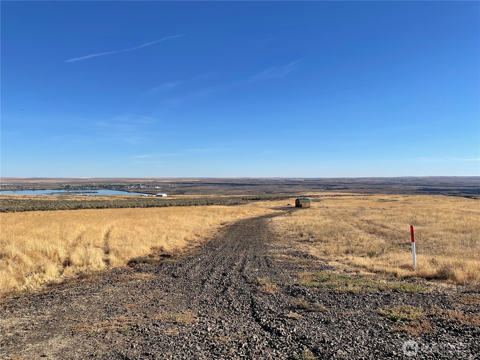 58 Banks Lake View Road, Unit 99115 Coulee City, WA 99115 - Photo 2 of 9 a view of an ocean and beach
