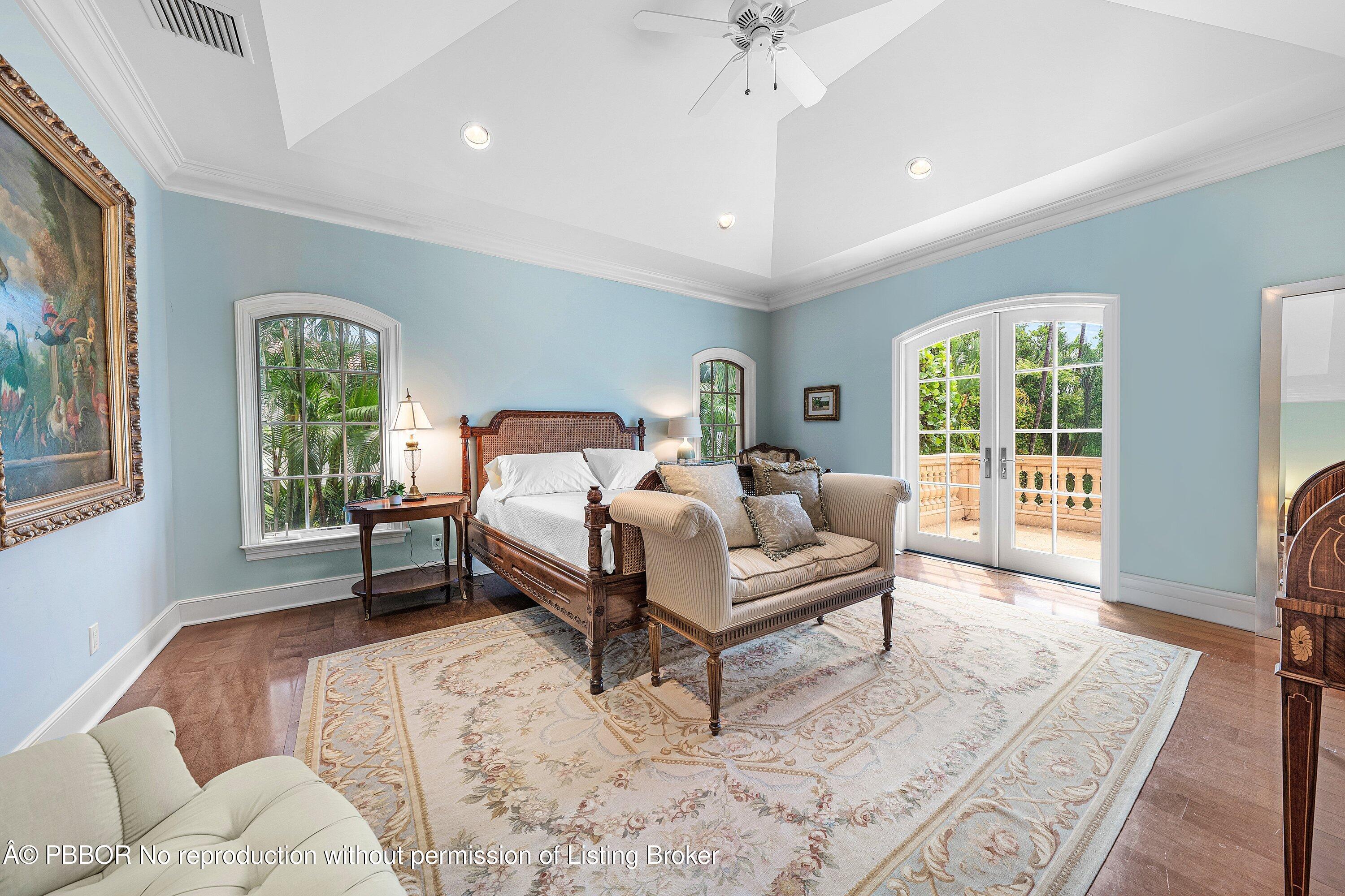 242 Wells Road Palm Beach, FL 33480 - Photo 26 of 54 a bedroom with furniture and a large window