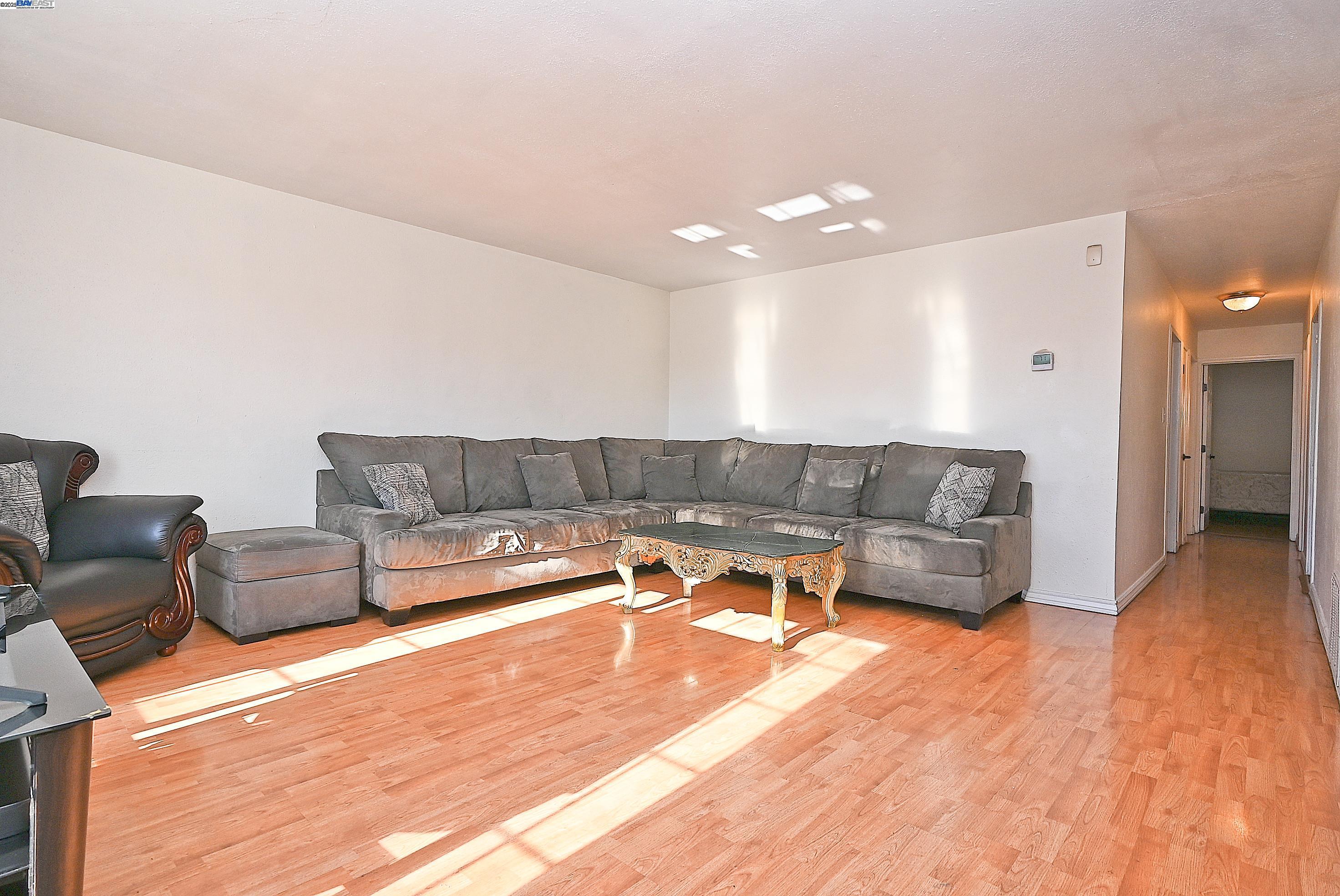 19092 Ricardo Avenue San Lorenzo, CA 94541 - Photo 8 of 29 a living room with furniture and wooden floor