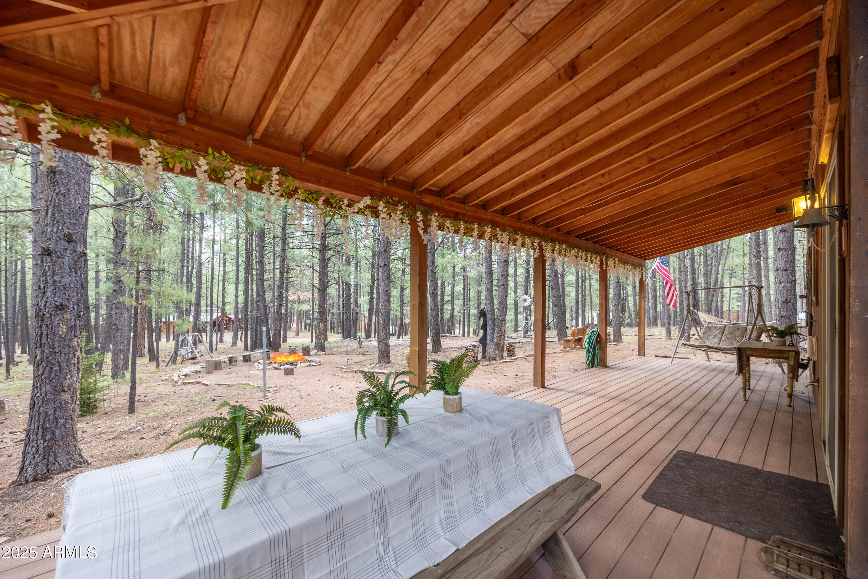 1643 Rifle Way Forest Lakes, AZ 85931 - Photo 24 of 40 a outdoor space with lots of furniture and wooden floor