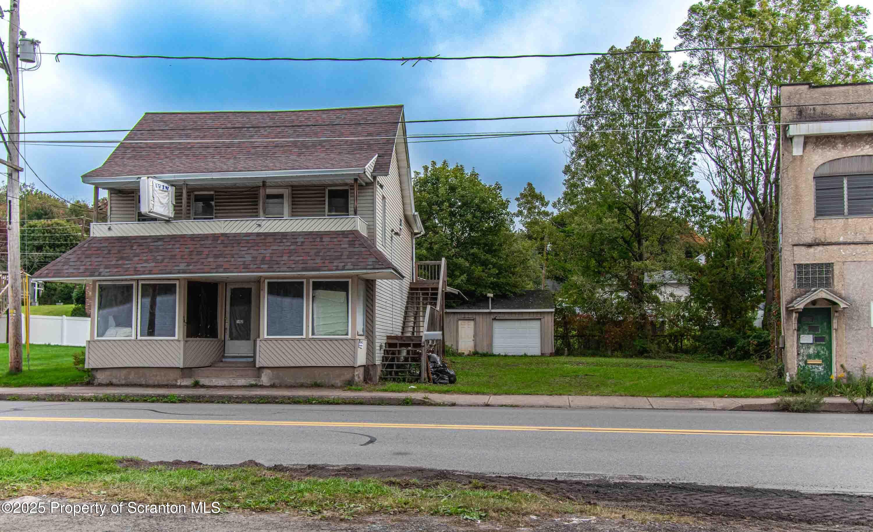 540 North Main Street Simpson, PA 18407 - Photo 17 of 17 a view of a house with a garden