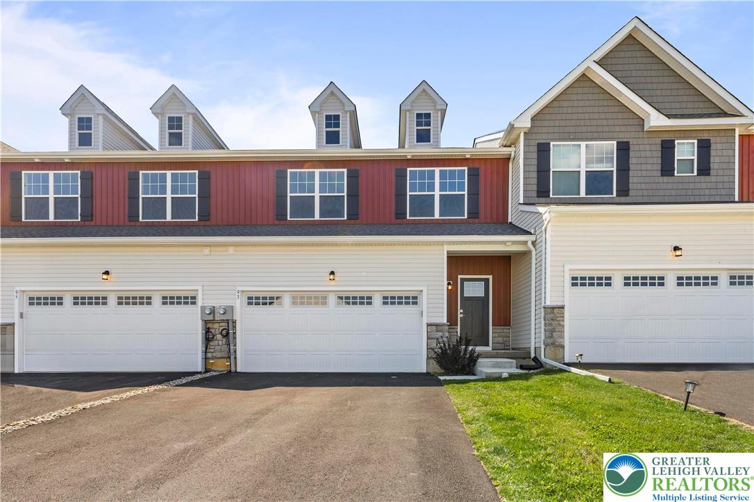 a view of house with yard