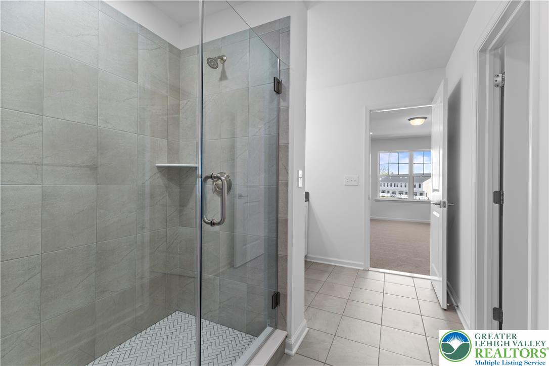 93 Timber Trail, Unit 46 Easton, PA 18045 - Photo 19 of 26 a bathroom with a shower