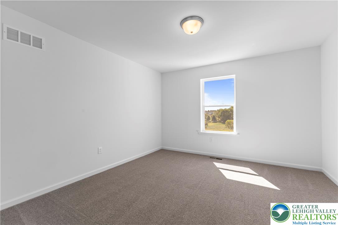 93 Timber Trail, Unit 46 Easton, PA 18045 - Photo 23 of 26 an empty room with a window