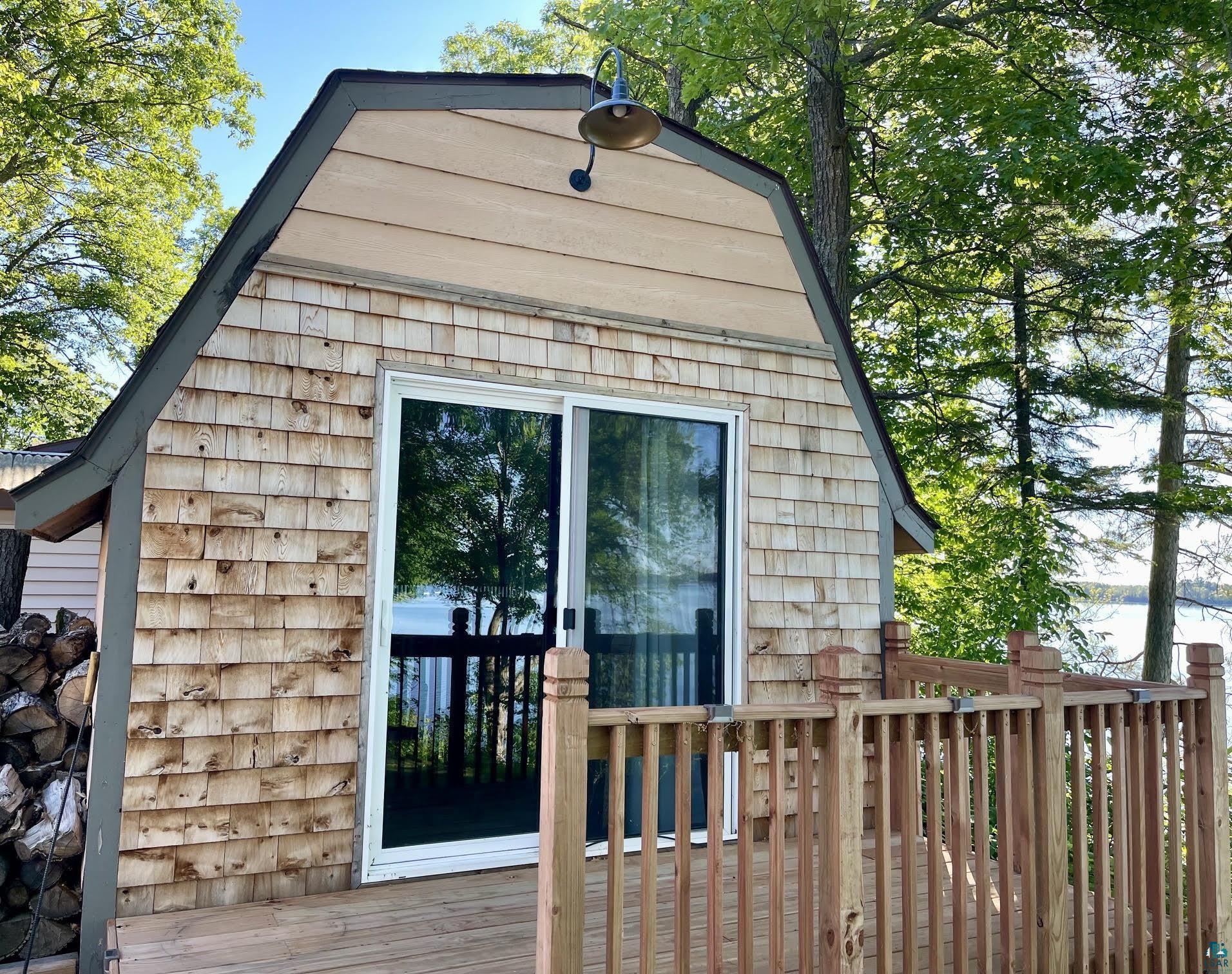 37460 Sunrise View Road Sturgeon Lake, MN 55783 - Photo 36 of 50 BONUS Lakeside bar building.