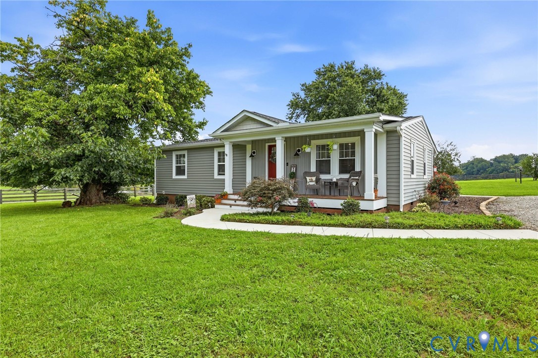 1108 Schroeder Road Powhatan, VA 23139 - Photo 2 of 33 Light gray horizontal siding with white trim, cove