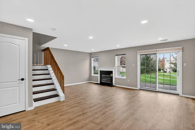 a view of entryway with wooden floor