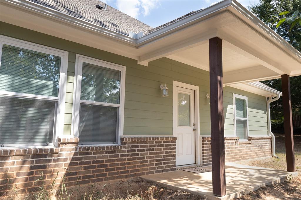 412 Crosby Street Lindale, TX 75771 - Photo 33 of 36 a front view of a house