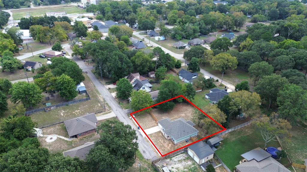412 Crosby Street Lindale, TX 75771 - Photo 36 of 36 an aerial view of residential house with outdoor space and swimming pool