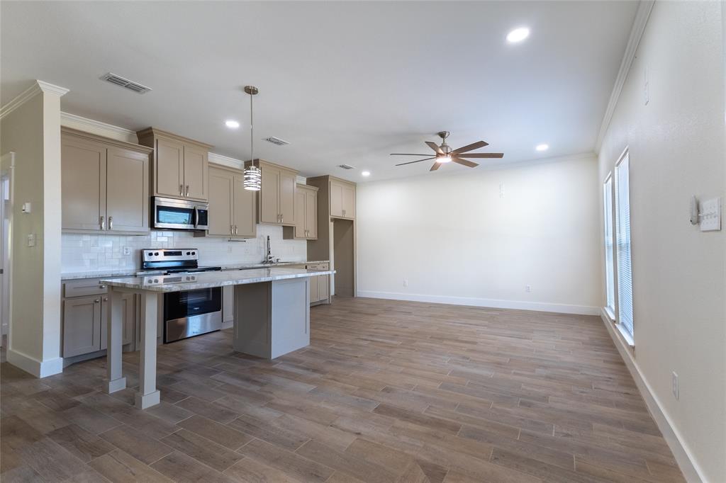 412 Crosby Street Lindale, TX 75771 - Photo 10 of 36 a view of kitchen with sink and refrigerator