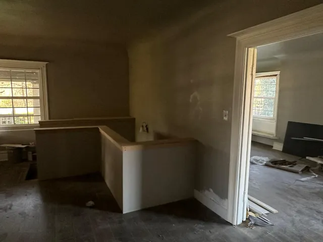 view of an empty room with a window