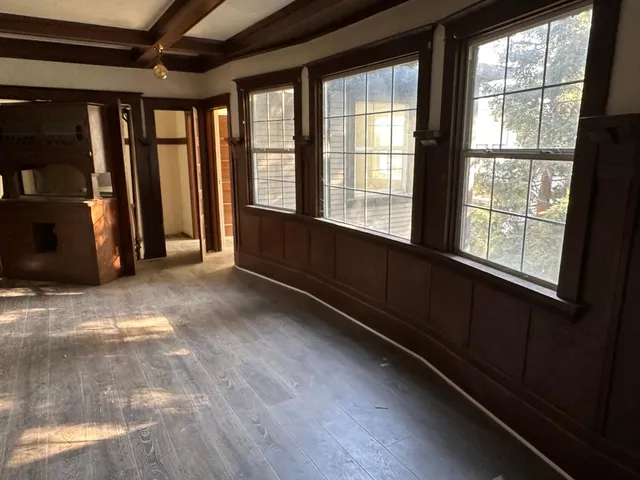 an empty room with windows