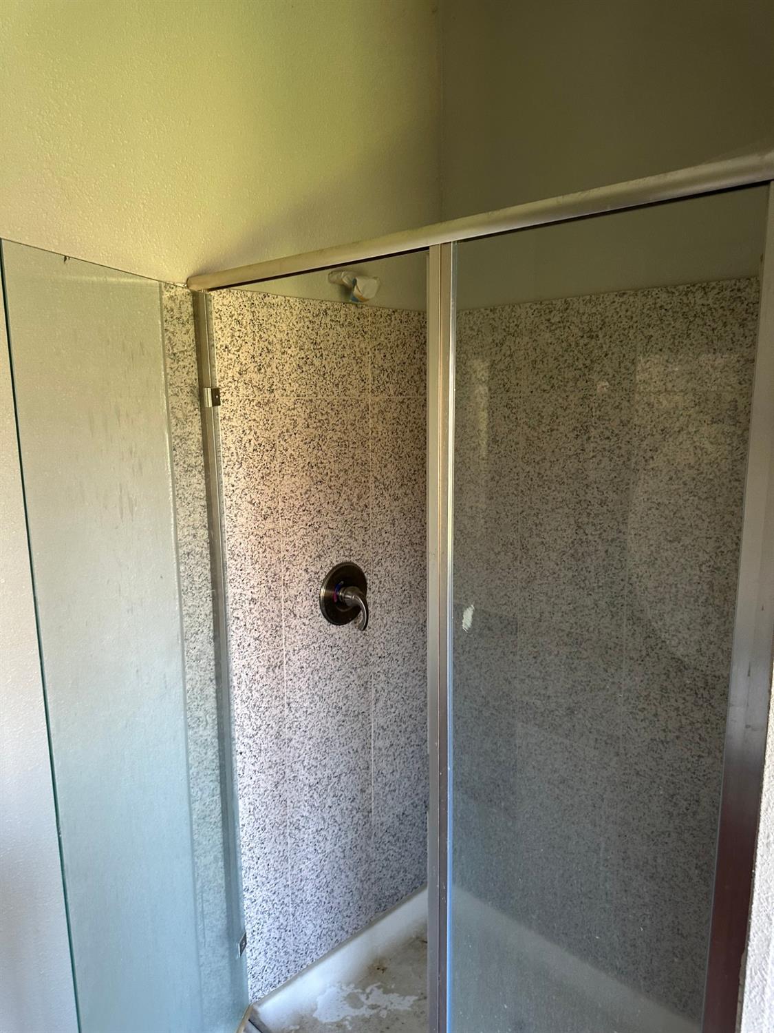 14055 River Road Walnut Grove, CA 95690 - Photo 32 of 55 a bathroom with a shower
