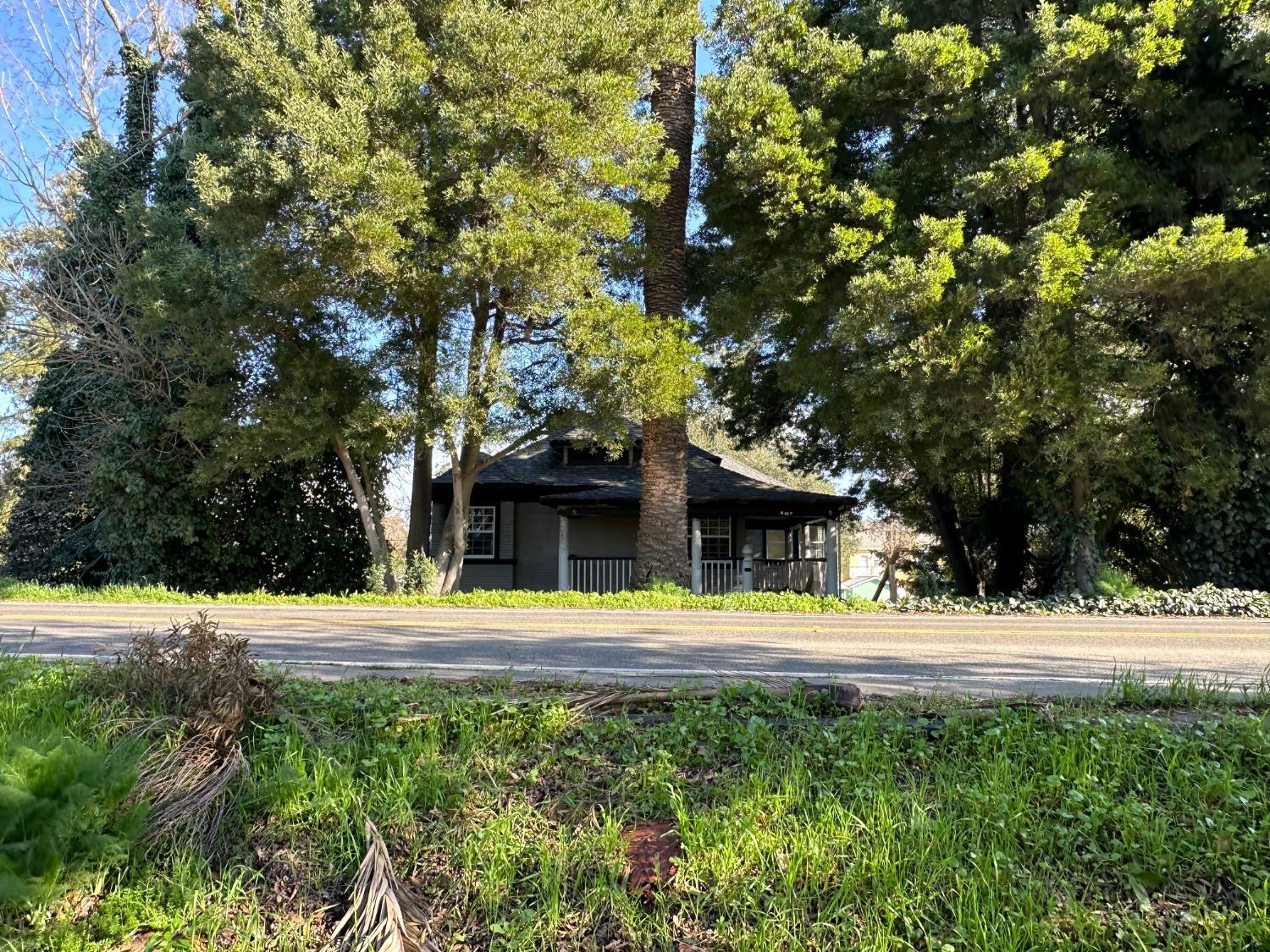 14055 River Road Walnut Grove, CA 95690 - Photo 8 of 55 a front view of a house with a yard