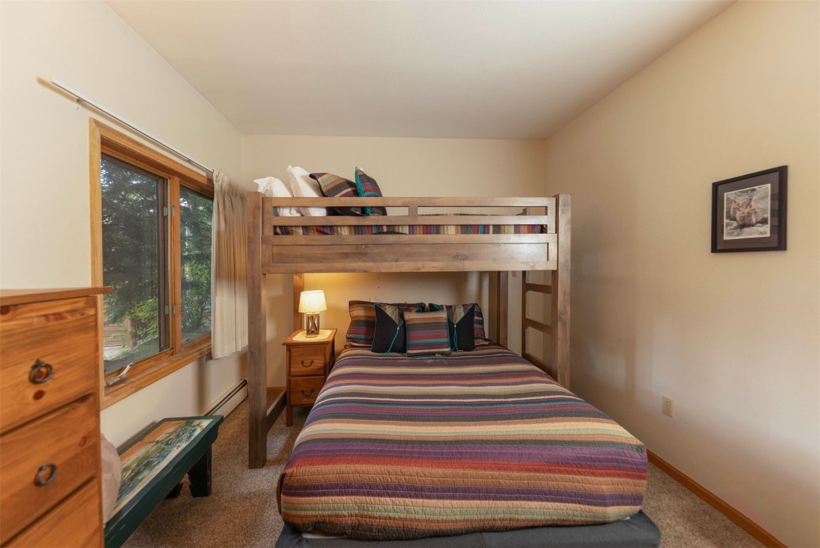 600 4 O Clock Road, Unit A11 Breckenridge, CO 80424 - Photo 16 of 22 a view of entryway and hall with wooden floor