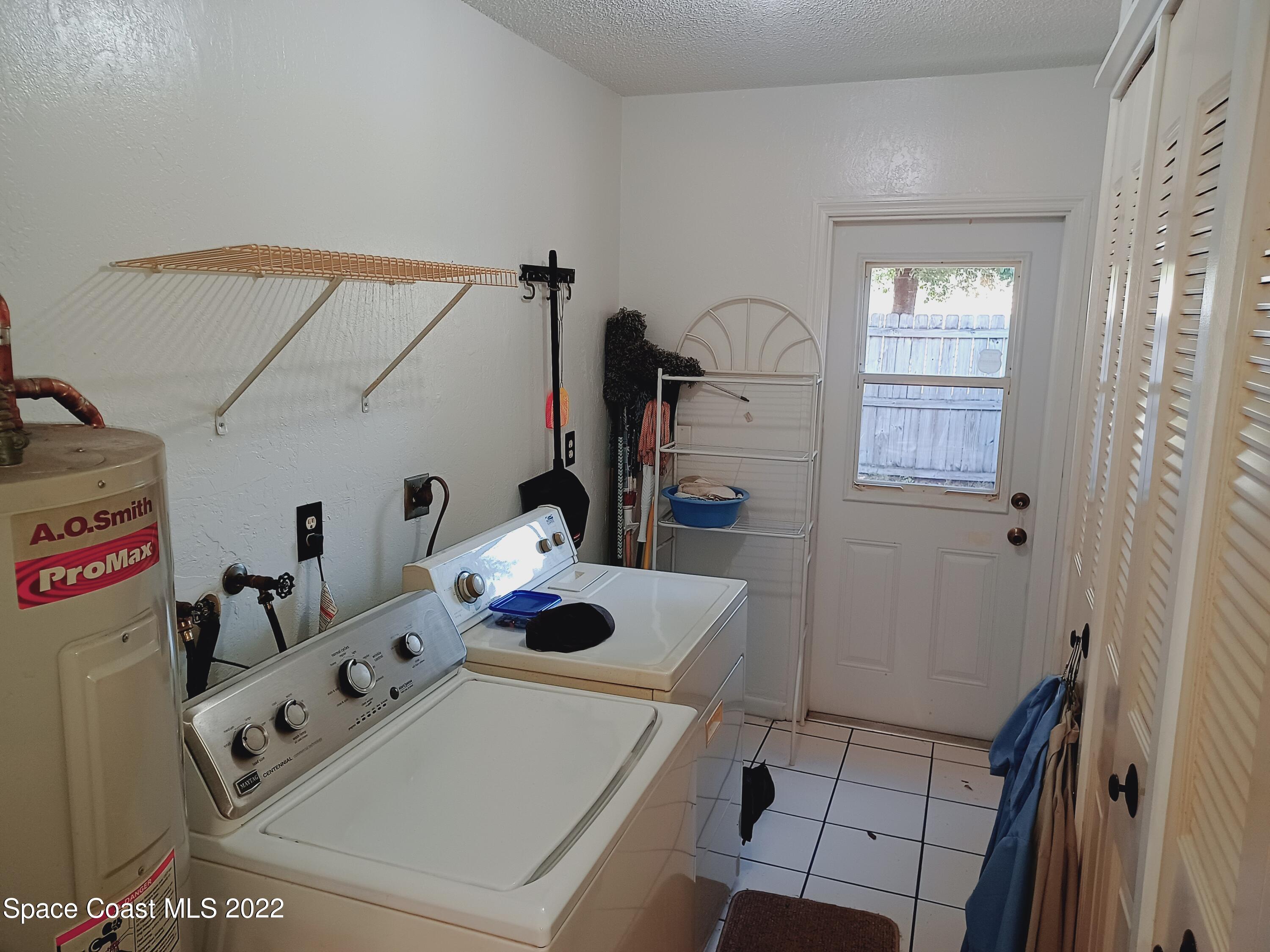 5480 Flint Road Cocoa, FL 32927 - Photo 10 of 20 a room with furniture and a table