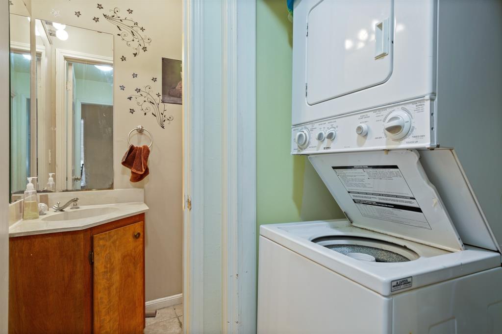 2529 Rio Grande Street, Unit 7 Austin, TX 78705 - Photo 13 of 13 a bathroom with a sink and a mirror