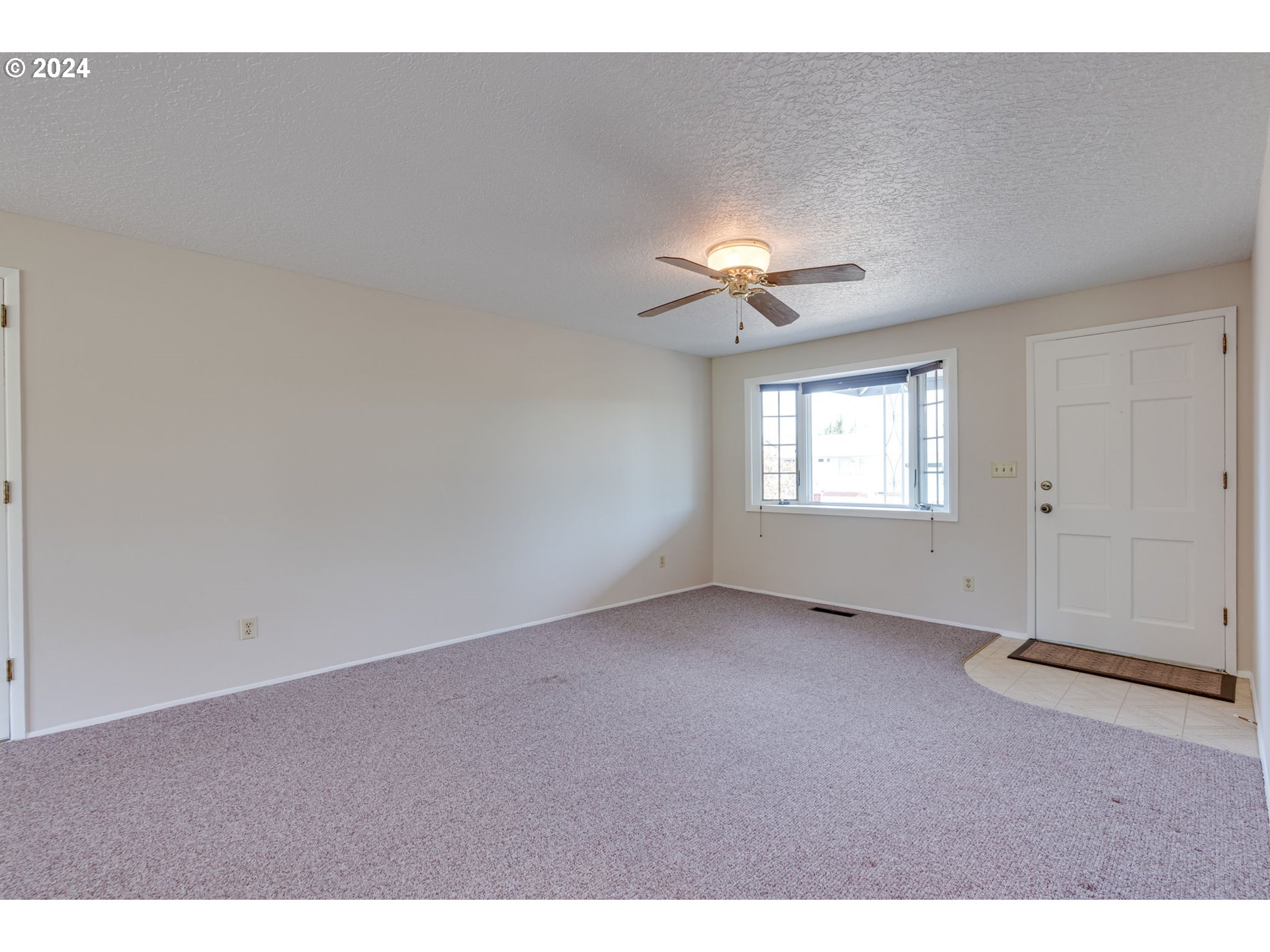 1585 Princeton Road Woodburn, OR 97071 - Photo 11 of 46 a view of an empty room with a window