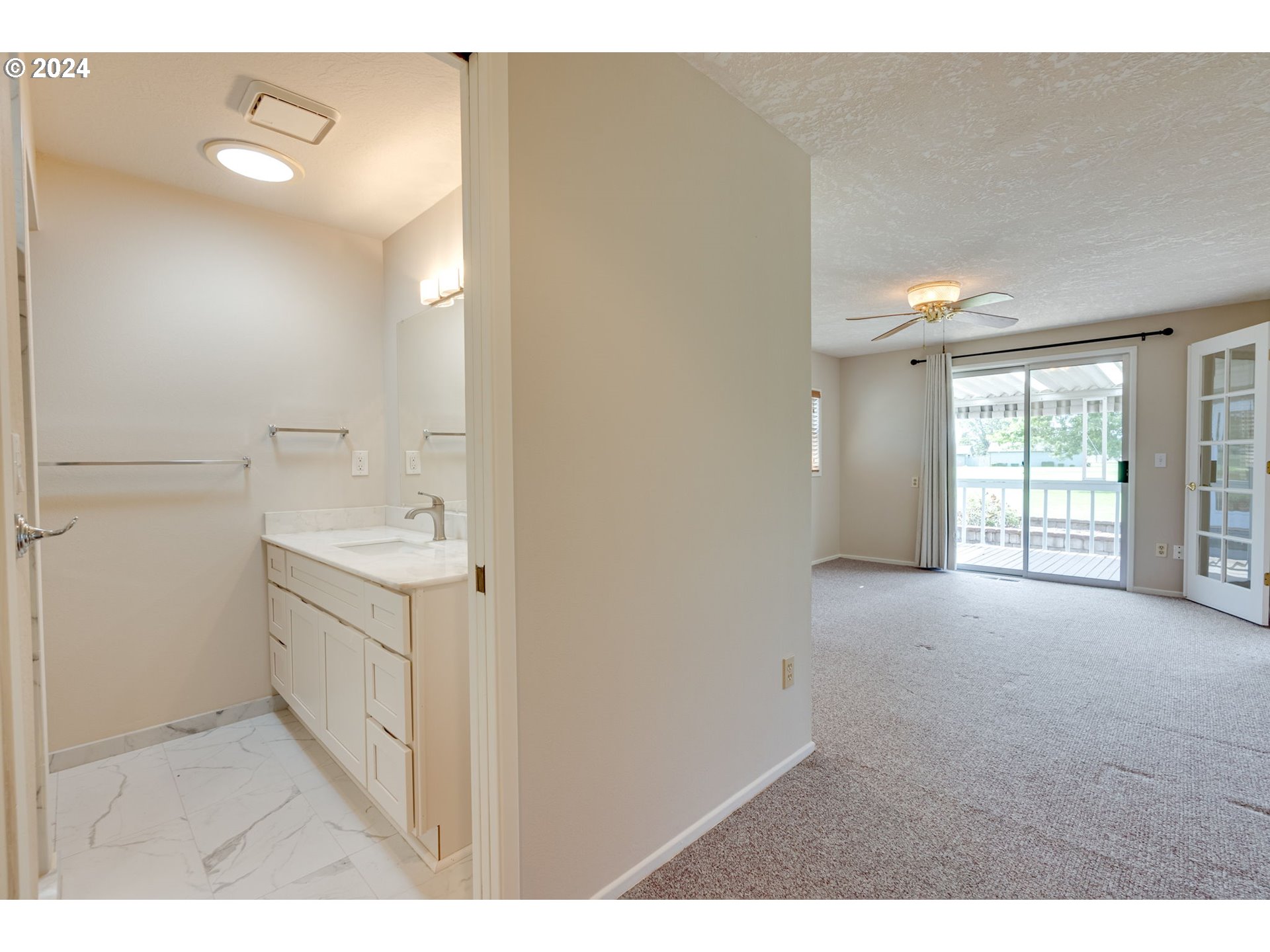 1585 Princeton Road Woodburn, OR 97071 - Photo 26 of 46 a bathroom with a sink vanity and a mirror