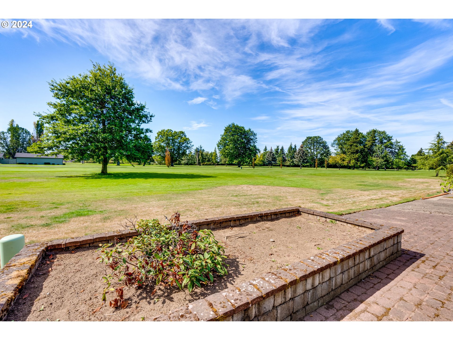 1585 Princeton Road Woodburn, OR 97071 - Photo 3 of 46 a view of a big yard with an outdoor space