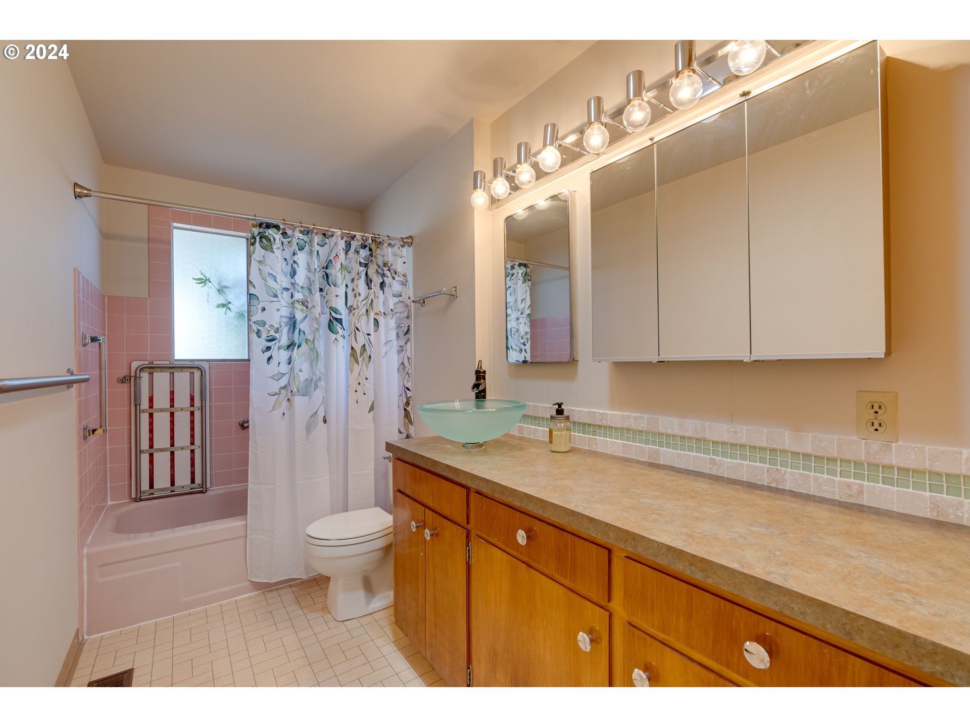 1585 Princeton Road Woodburn, OR 97071 - Photo 31 of 46 a bathroom with a granite countertop sink a toilet a mirror and shower