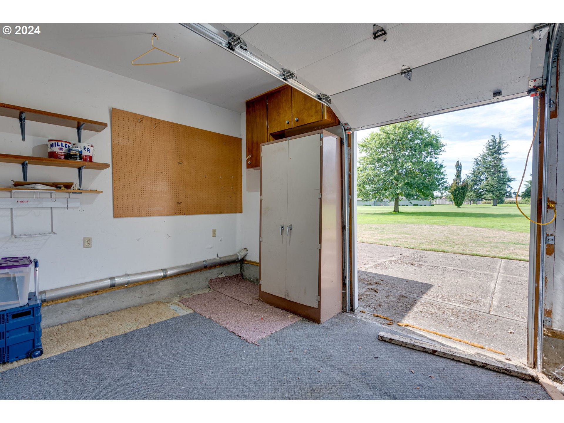 1585 Princeton Road Woodburn, OR 97071 - Photo 45 of 46 a view of a room with wooden floor and a porch