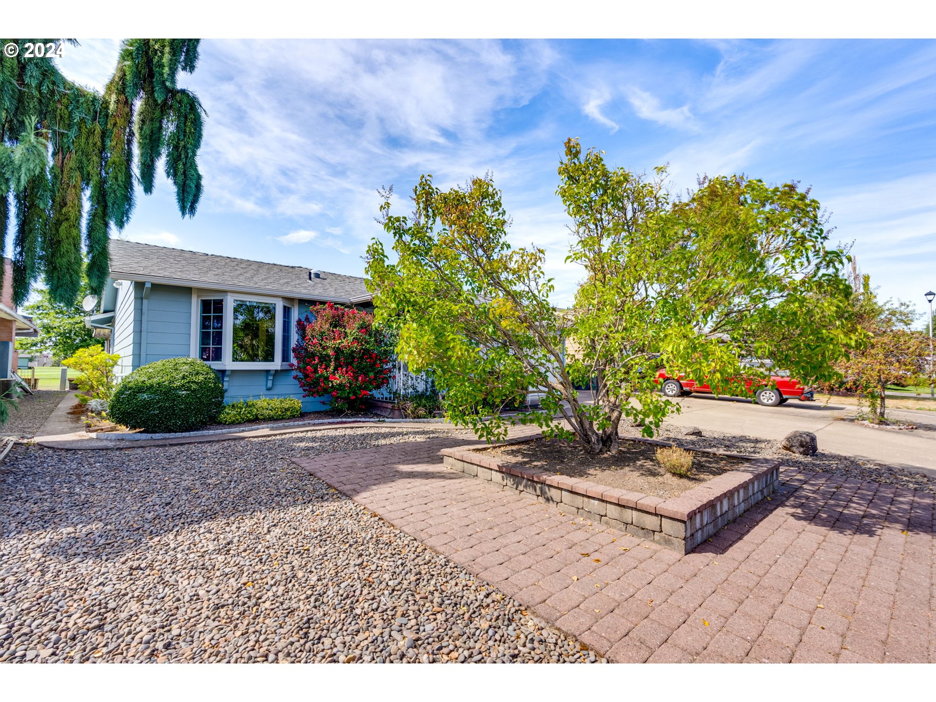 1585 Princeton Road Woodburn, OR 97071 - Photo 6 of 46 a view of a backyard with a garden
