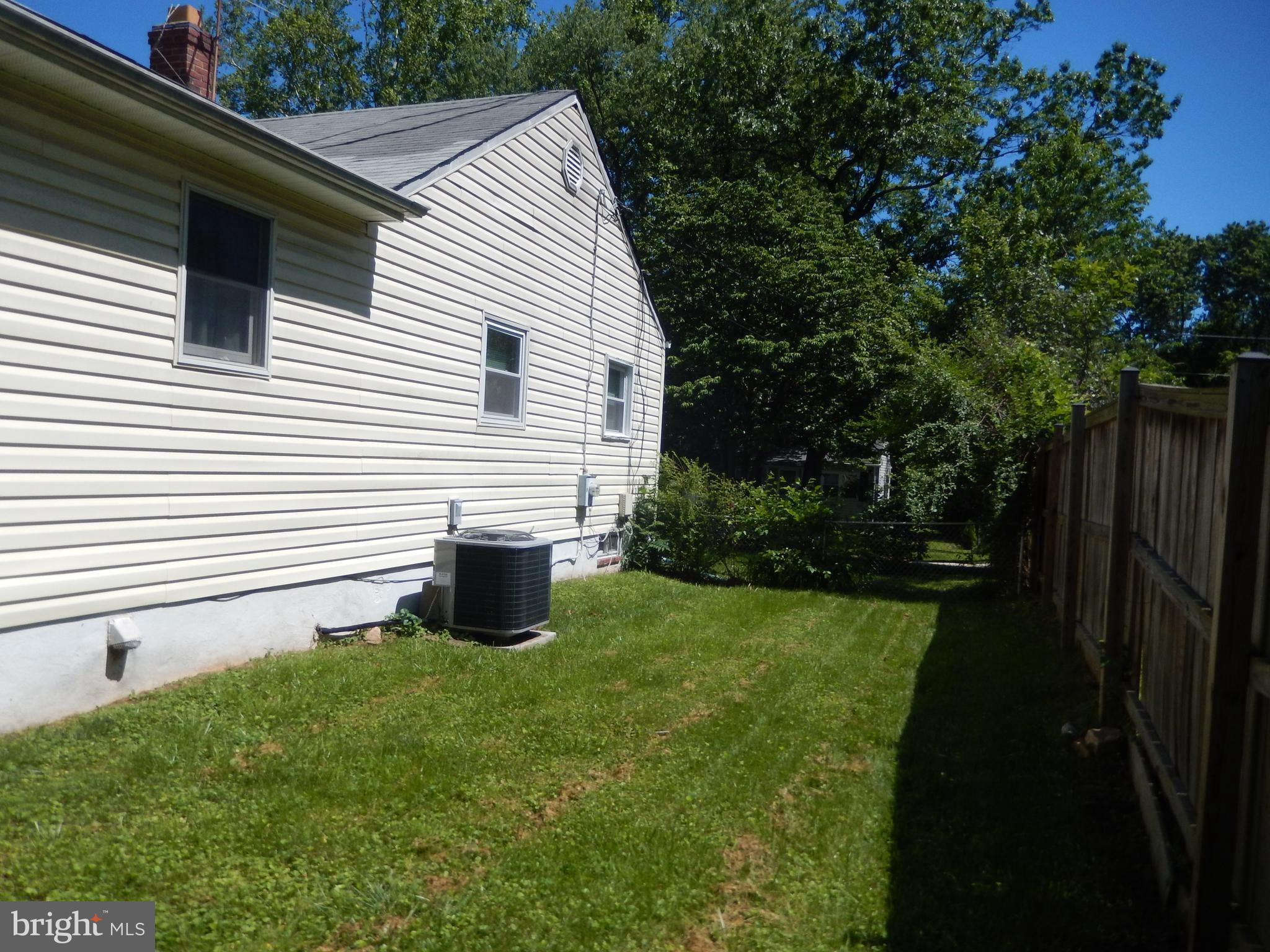 12210 Middle Road Silver Spring, MD 20906 - Photo 3 of 30 a view of a house with backyard