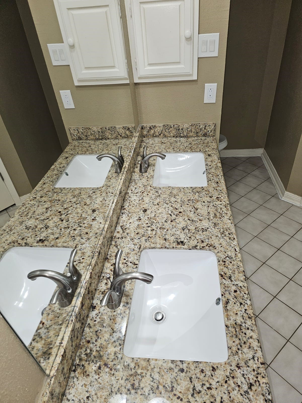 2618 Quarry Hill Road Sugar Land, TX 77478 - Photo 12 of 15 a bathroom with a sink and a mirror