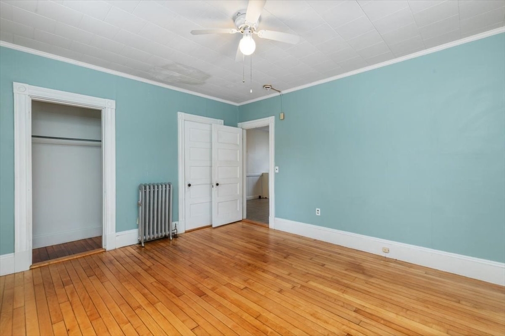 20-22 Florence Street Andover, MA 01810 - Photo 13 of 42 a view of empty room with wooden floor