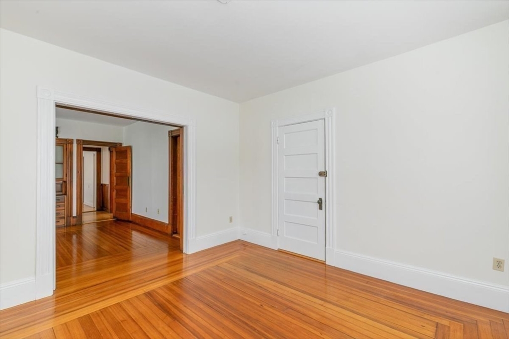 20-22 Florence Street Andover, MA 01810 - Photo 20 of 42 a view of an empty room with wooden floor