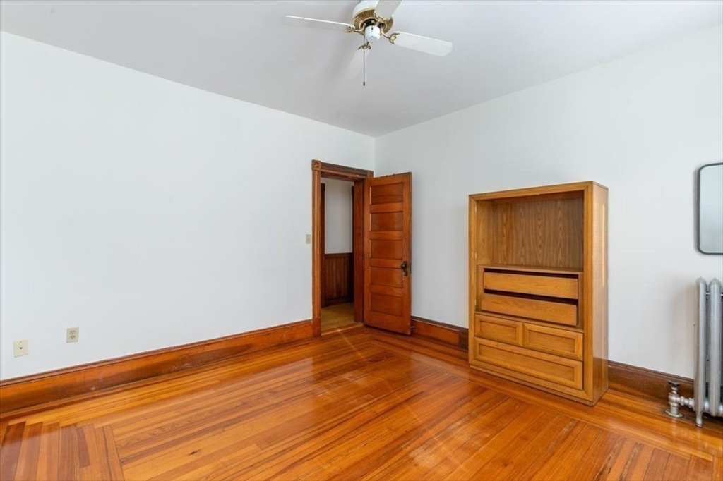 20-22 Florence Street Andover, MA 01810 - Photo 25 of 42 a view of empty room with wooden floor