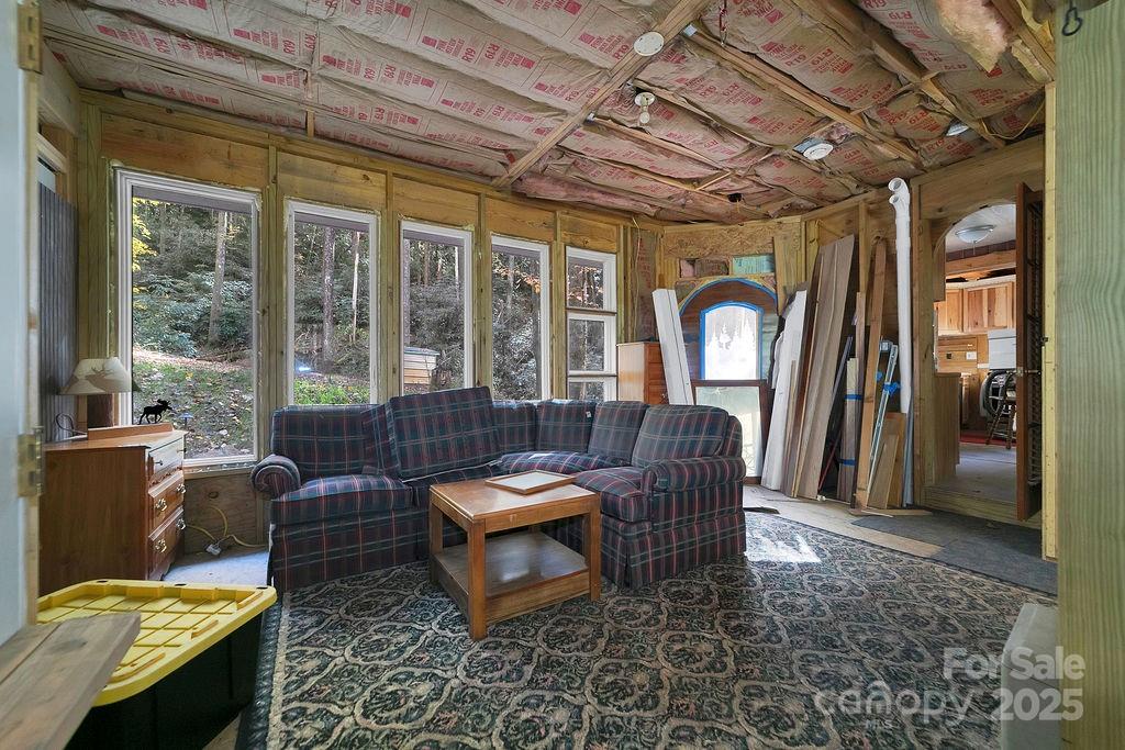 3761 Frozen Creek Road, Unit 31 32 33 Brevard, NC 28712 - Photo 15 of 25 a living room with furniture and a window