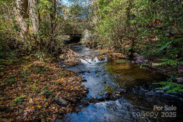 a view of a lake with green space