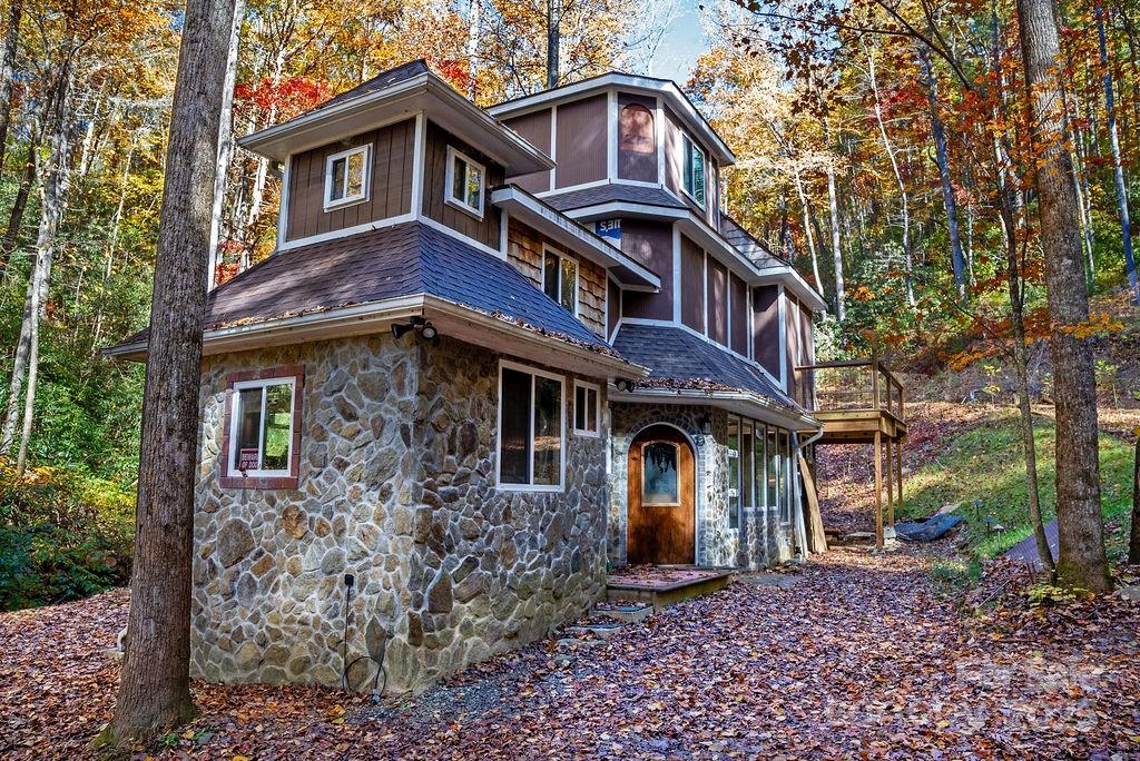 3761 Frozen Creek Road, Unit 31 32 33 Brevard, NC 28712 - Photo 4 of 25 a front view of a house with garden