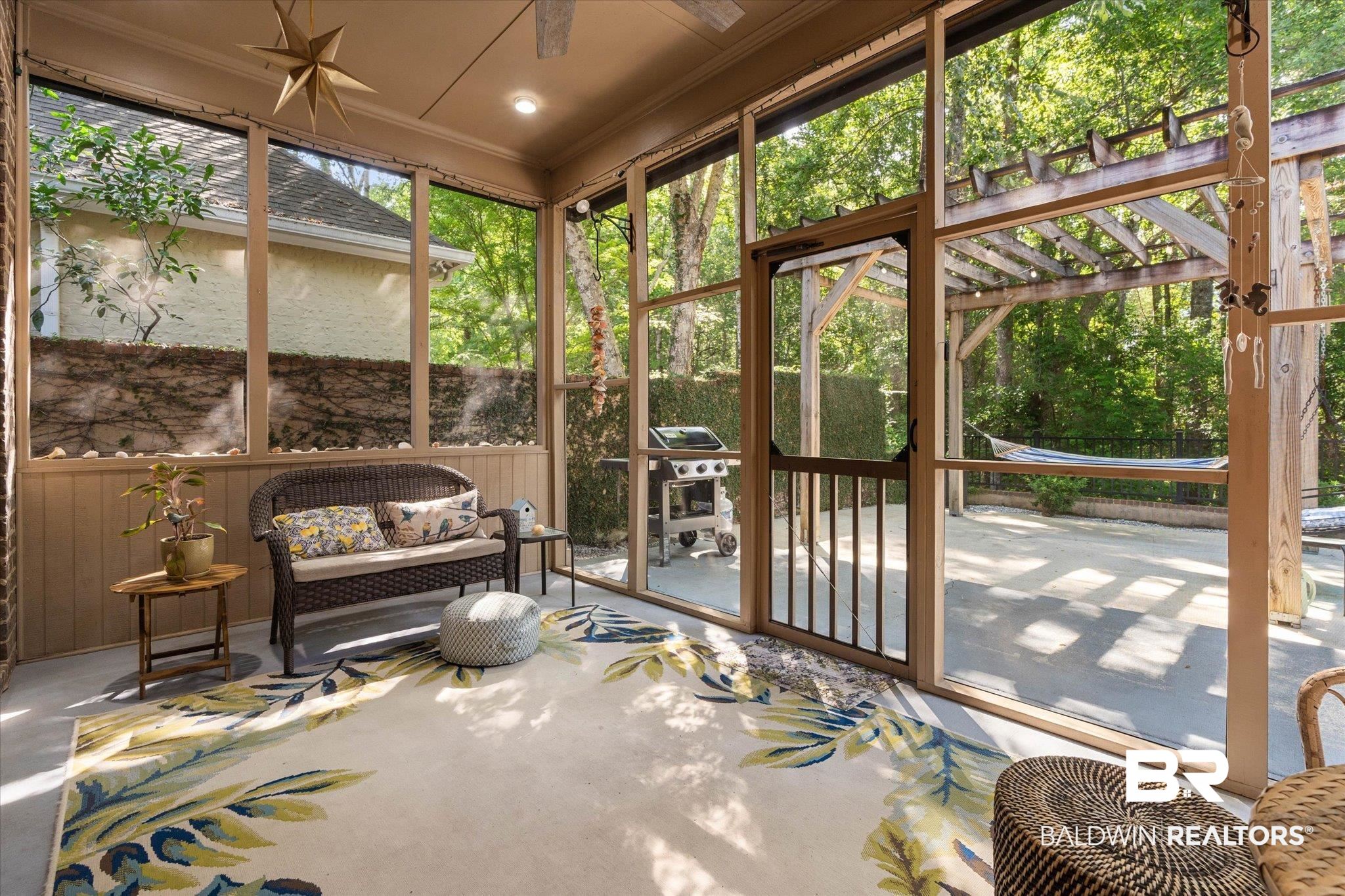 3400 Rue Royal Mobile, AL 36693 - Photo 25 of 33 Sunroom / solarium featuring ceiling fan and an outdoor living space