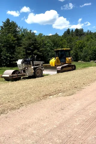a view of yard with swimming pool and green space