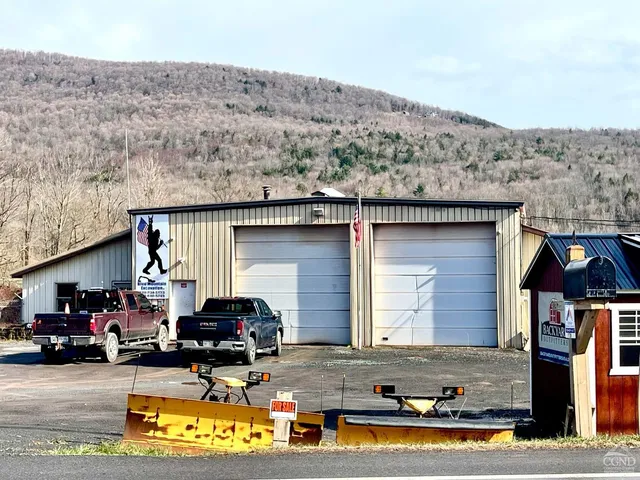 a car parked in front of a house