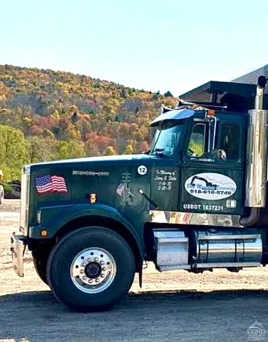 a view of a car in front of a house