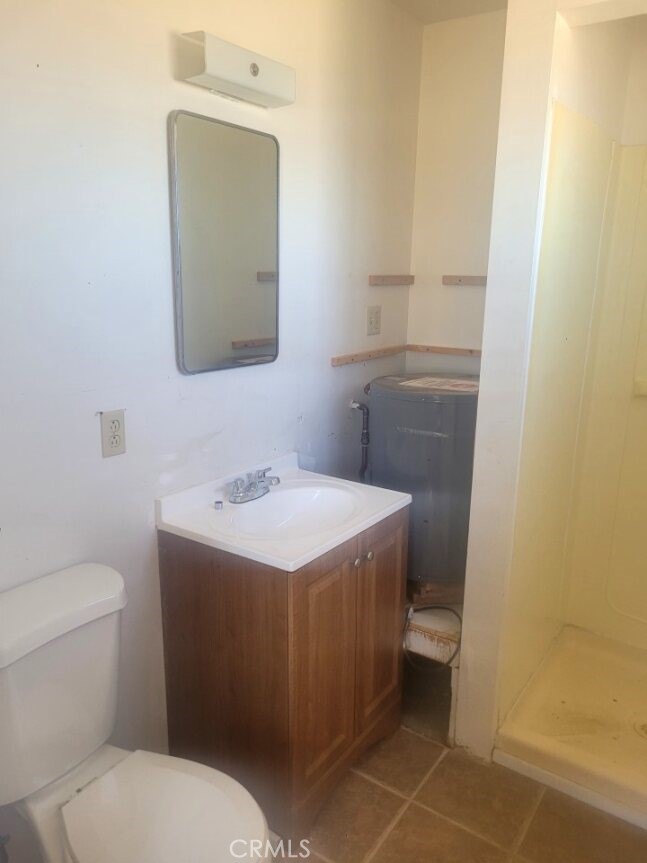 50471 Cholla Road Johnson Valley, CA 92285 - Photo 14 of 19 a bathroom with a sink toilet and mirror
