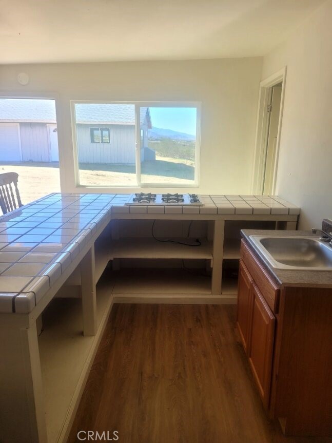 50471 Cholla Road Johnson Valley, CA 92285 - Photo 4 of 19 a kitchen with a sink and a stove