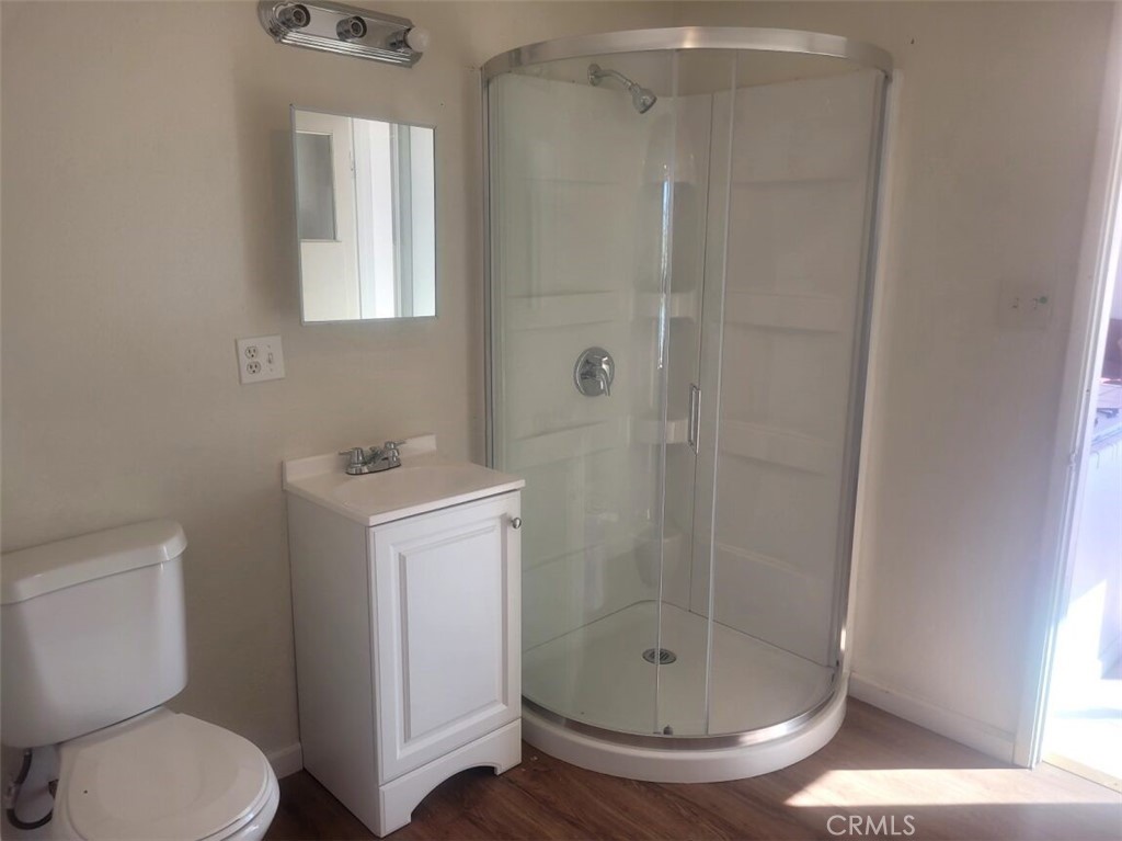 50471 Cholla Road Johnson Valley, CA 92285 - Photo 7 of 19 a bathroom with a shower a toilet and a sink