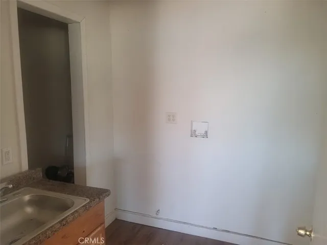 a bathroom with a sink and vanity