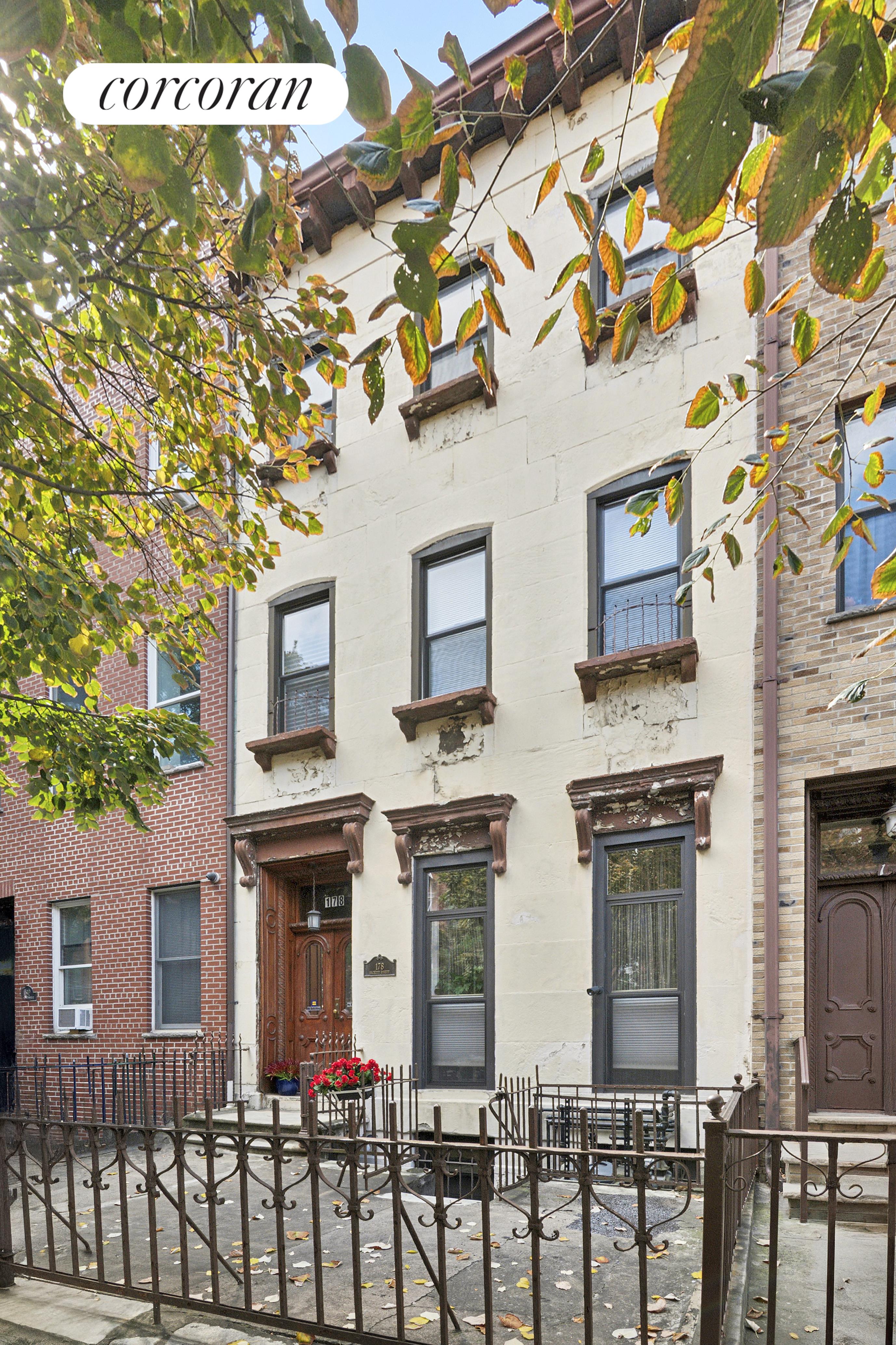 178 Sackett Street Brooklyn, NY 10017 - Photo 12 of 13 a view of a brick house with large windows