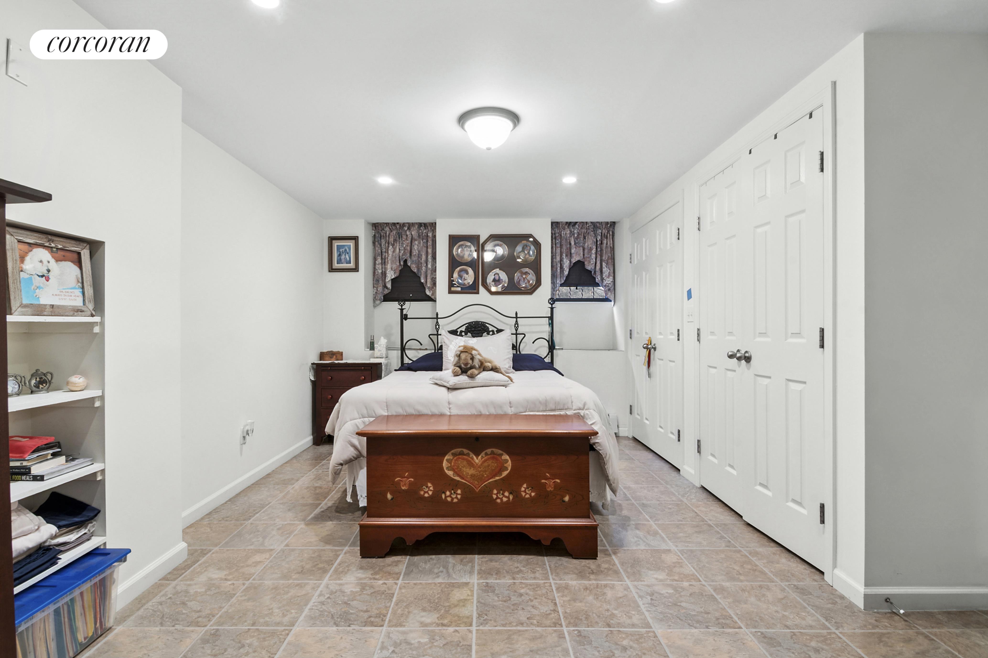 178 Sackett Street Brooklyn, NY 10017 - Photo 4 of 13 a living room with furniture and a rug