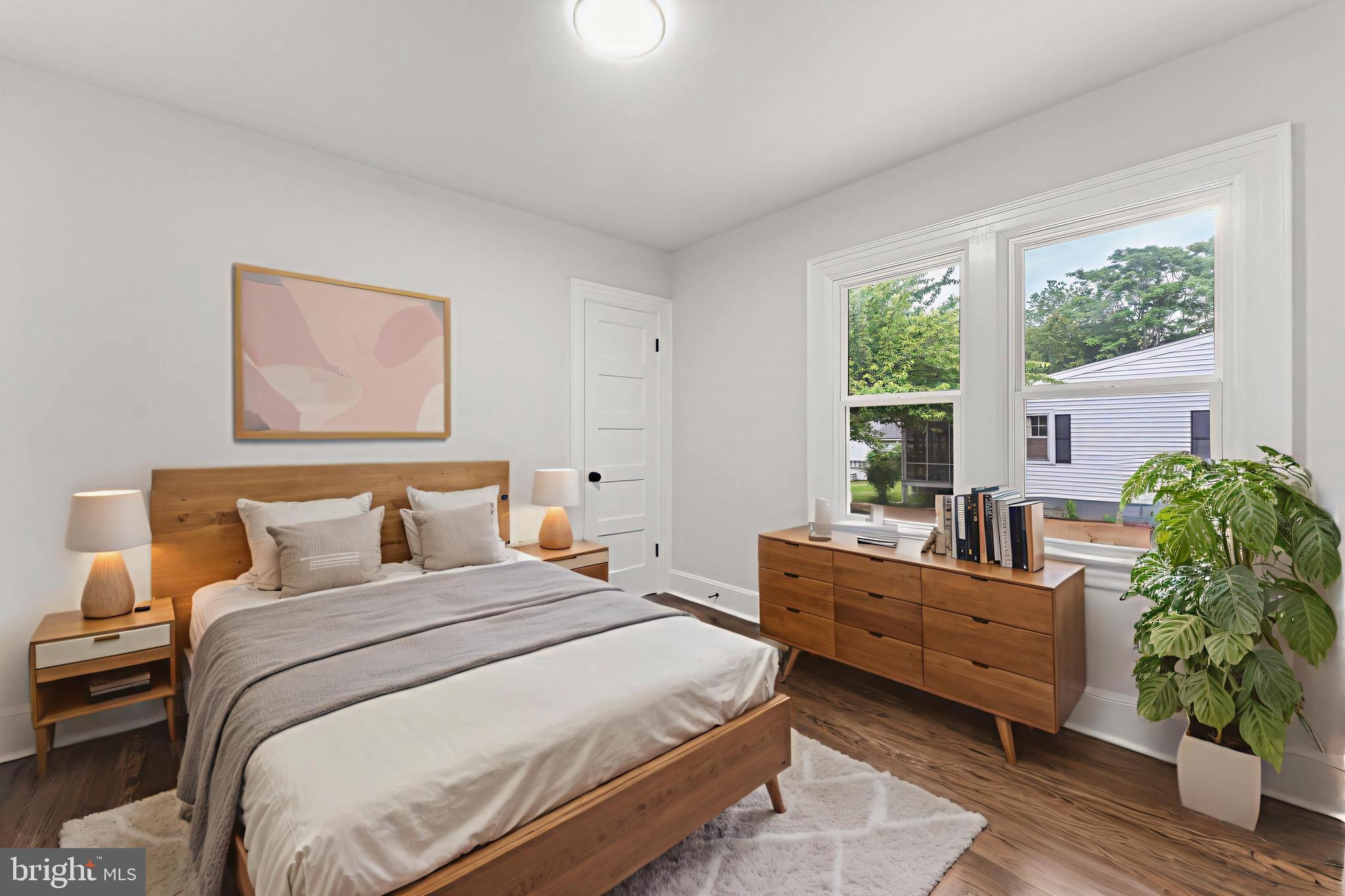 10221 Dahlgren Road King George, VA 22485 - Photo 15 of 31 a bedroom with bed and windows