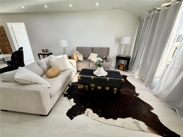 a bed room with a bed and a couch